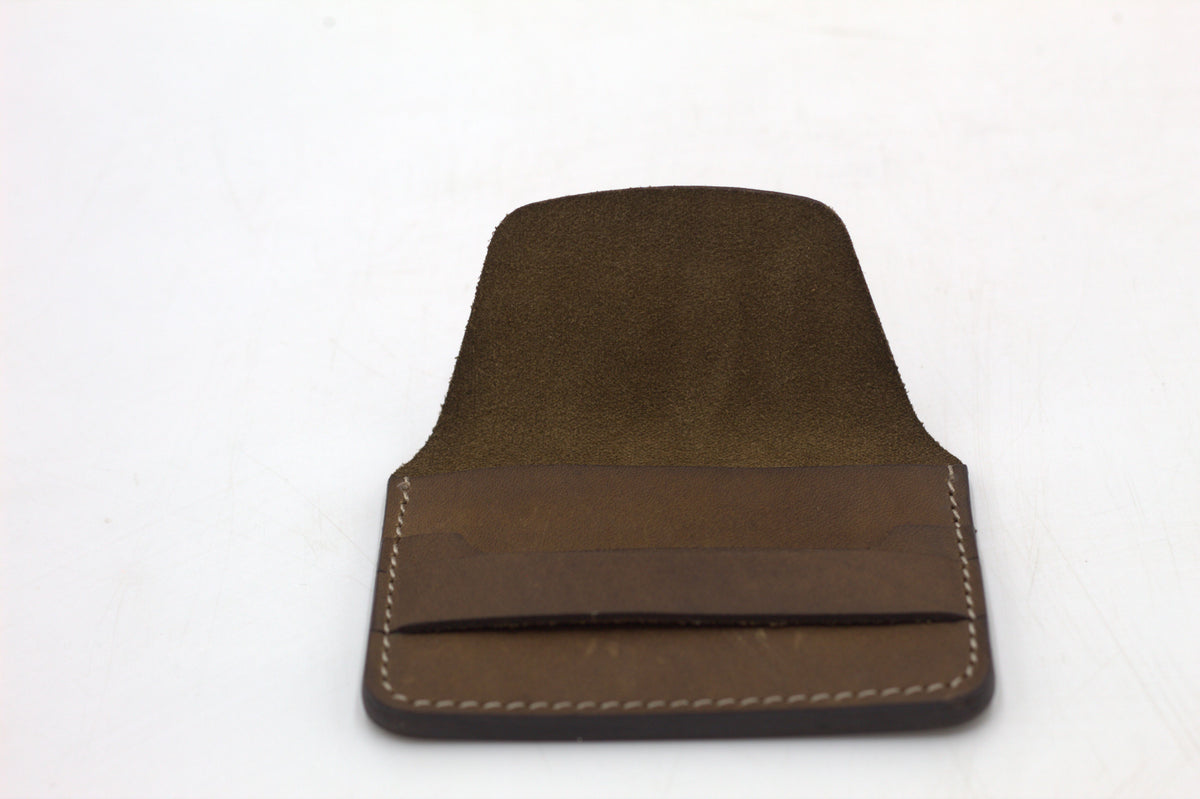 A brown leather wallet with multiple card slots visible.