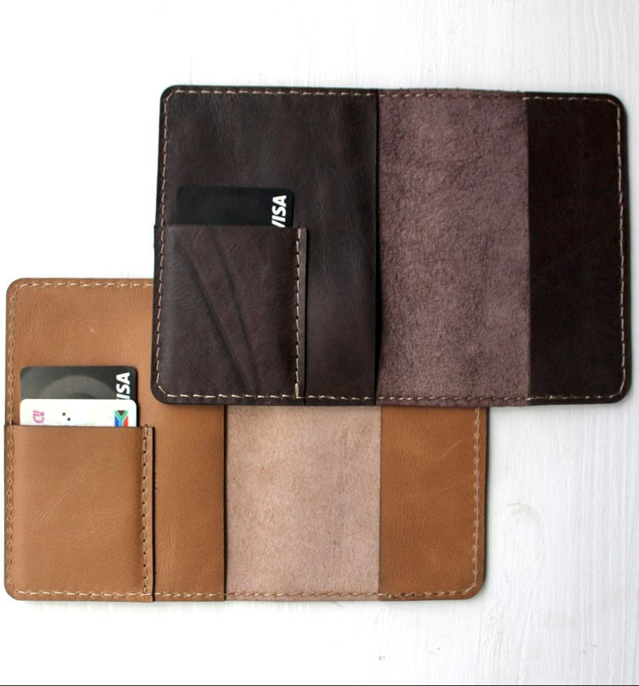 Multicolored leather wallet with card slots on a white background
