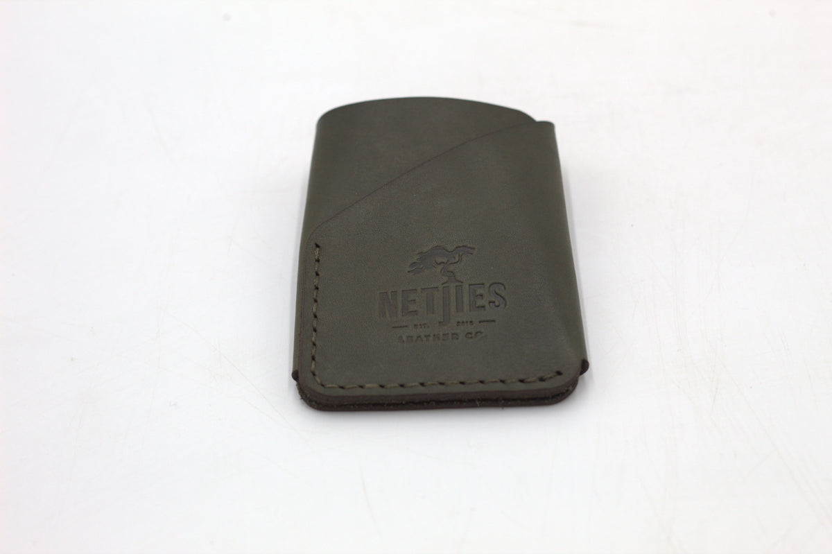 Brown leather coin purse on a white background