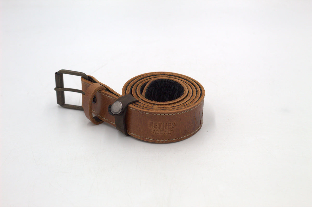 A brown leather belt with a metal buckle, placed against a white background.