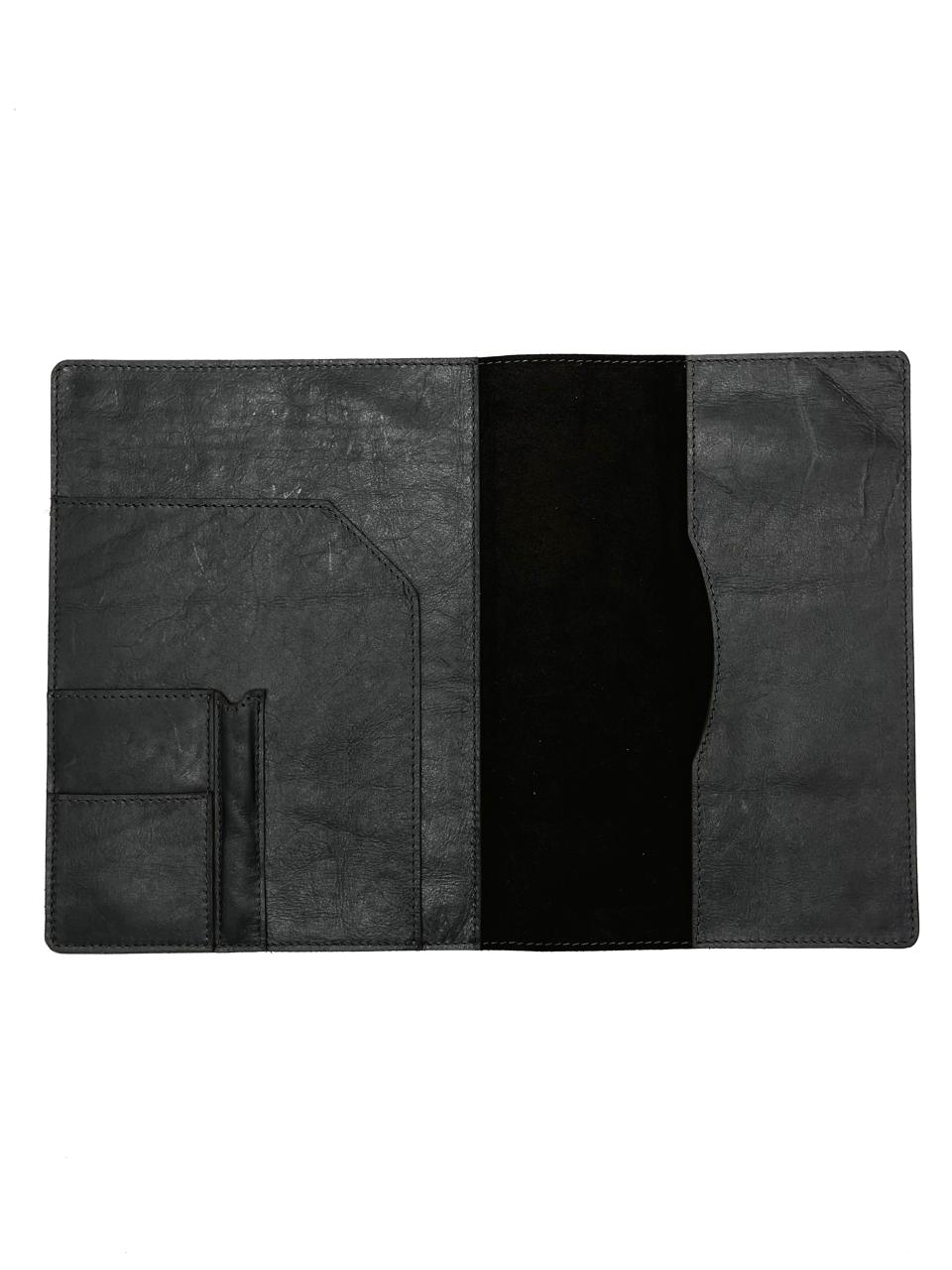 A black leather A4 book folder opened to reveal multiple compartments and a suede finish