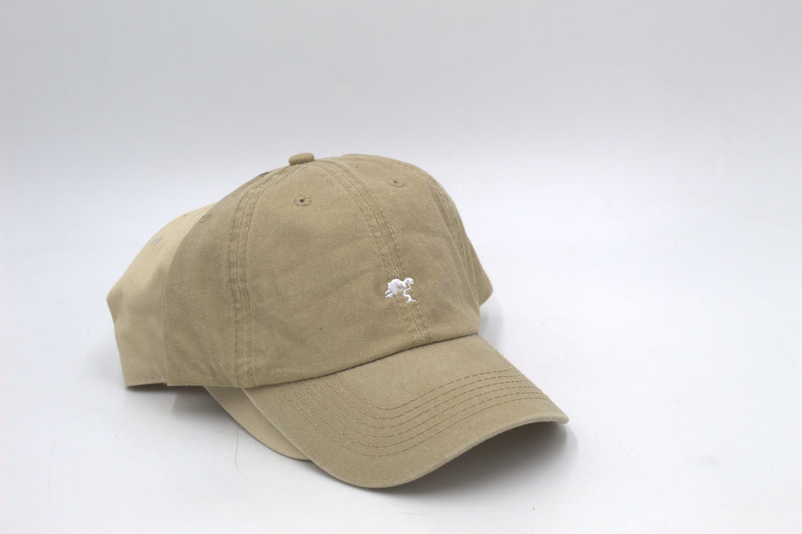 A beige colored cap with a logo on the front.